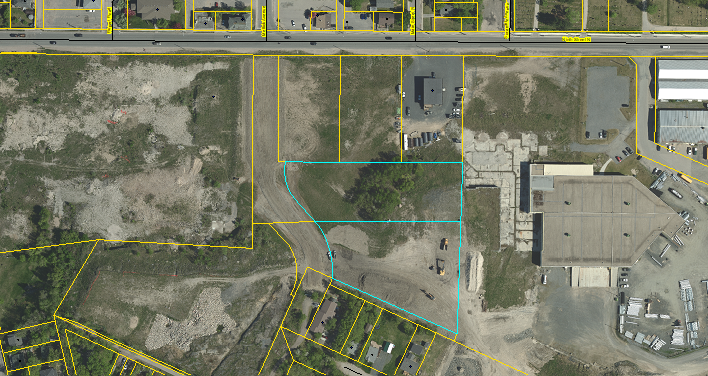 aerial view of the subject property outlined in blue