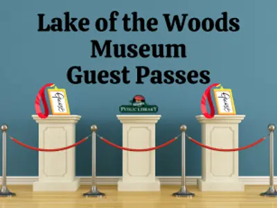 Three podiums with a red rope in front of them.