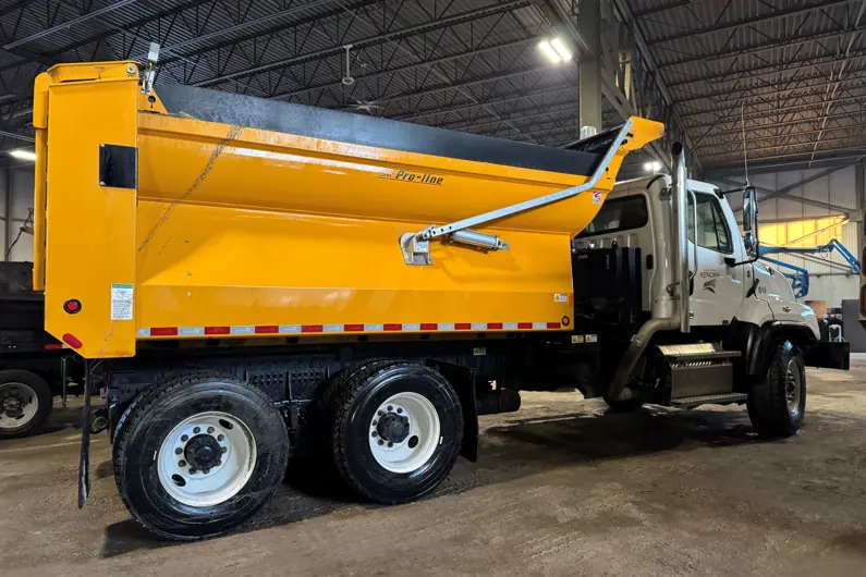 Side view of a plow truck