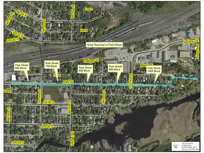 [Aerial map highlighting Park Street in blue, showing sections from 600 to 1000 block for snow removal. Surrounding streets are labelled in yellow.}