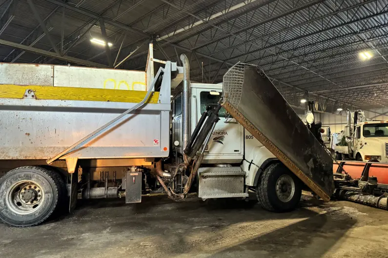 Side view of a plow truck